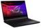 Ein Gaming-Laptop mit beleuchteter Tastatur zeigt auf dem Bildschirm das 'ROG Strix'-Logo und die Wörter 'ROG', 'Gamer' und '2016'.