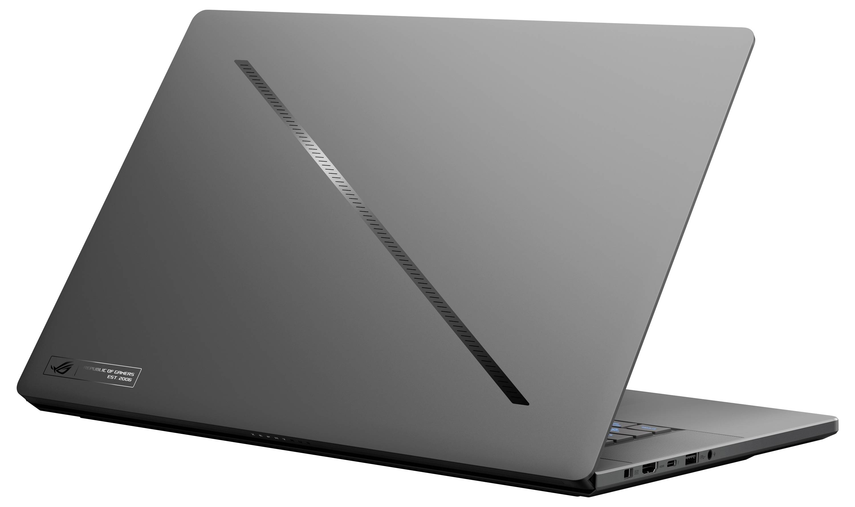 Ein geschlossenes Laptop in dunkelgrau mit schräger Linie auf der Rückseite. Es steht auf einem Tisch, ohne sichtbare Markenkennzeichen.