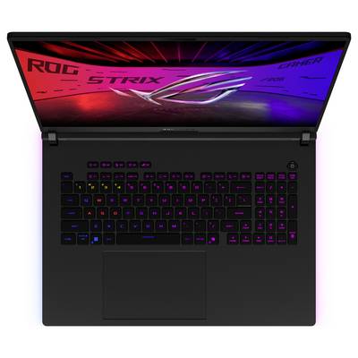 Ein Gaming-Laptop mit beleuchteter Tastatur. Auf dem Bildschirm steht 'ROG STRIX'.