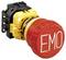 Not-Aus-Schalter mit rotem Knopf und den Buchstaben 'EMO', umgeben von einem gelben Gehäuse, oft genutzt zur Sicherheitsabschaltung von Maschinen.