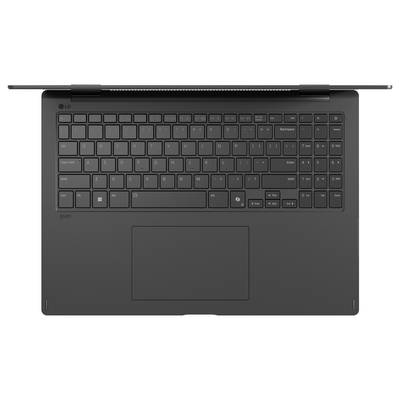 Ein schwarzer Laptop mit vollständiger QWERTZ-Tastatur und großem Touchpad. Die obere Bildschirmkante ist teilweise sichtbar.