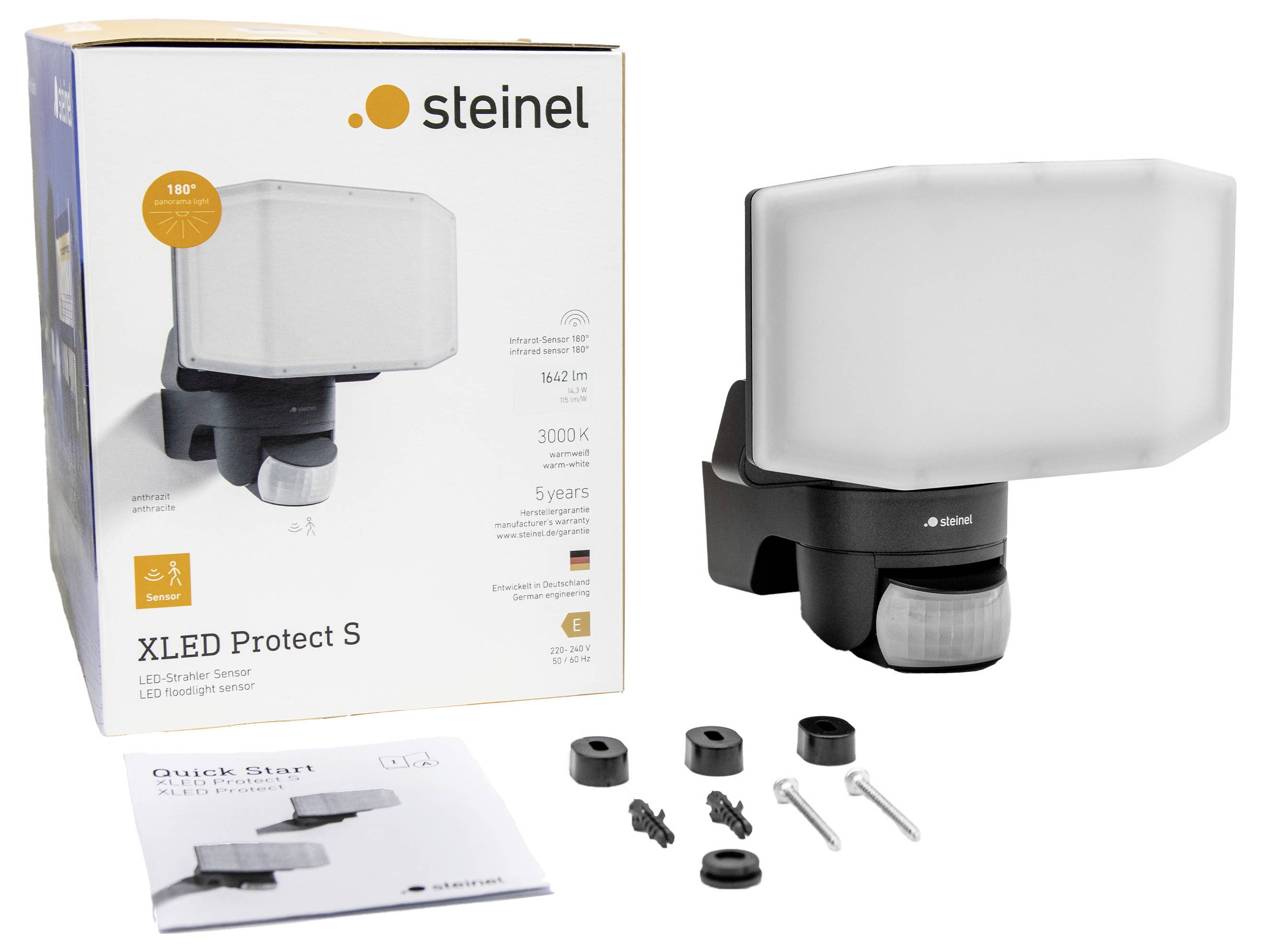 LED-Strahler Steinel XLED Protect S, abgebildet mit Verpackung, Befestigungsmaterial und Bedienungsanleitung. Bewegungsmelder integriert.