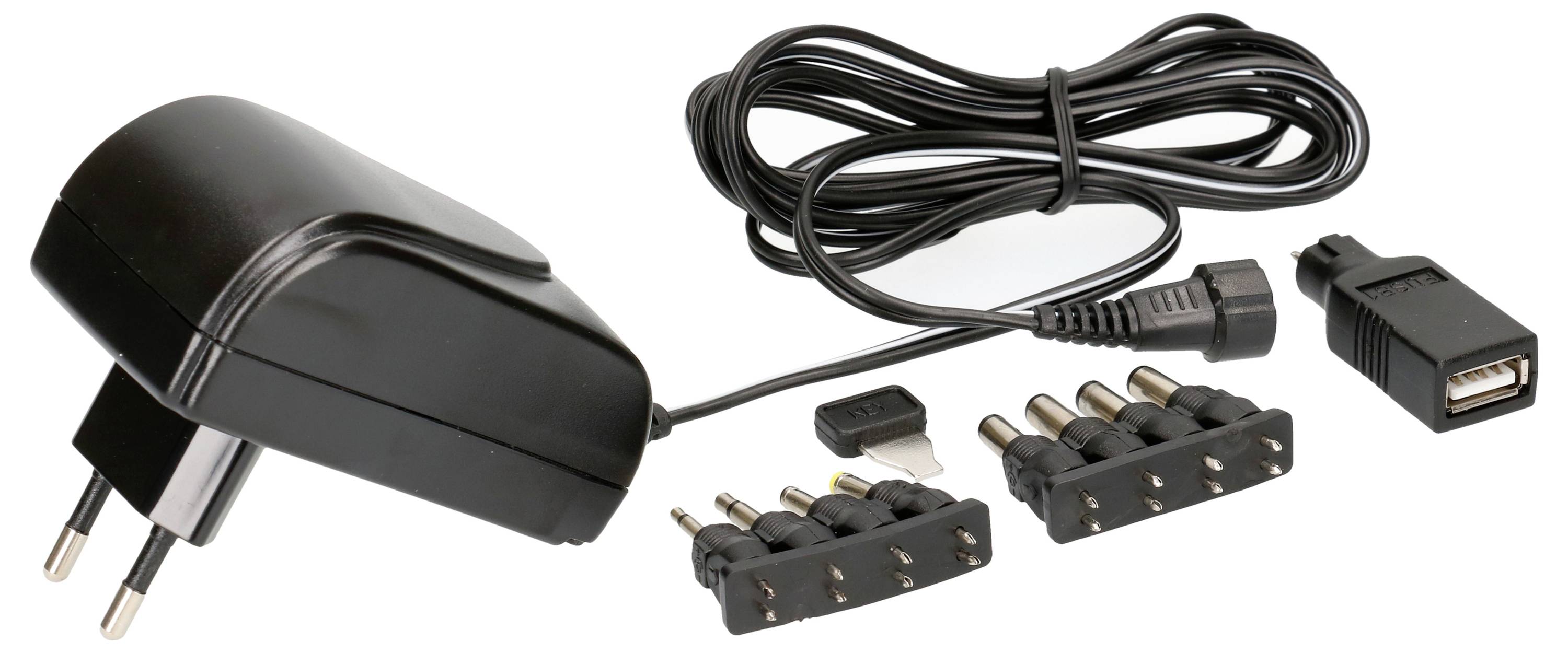 Verschiedene Netzteiladapter mit austauschbaren Steckern und USB-Anschluss, geeignet für unterschiedliche elektronische Geräte.