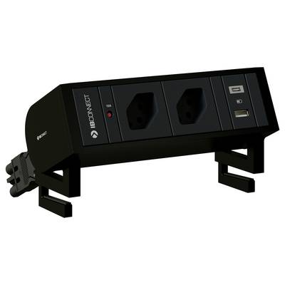 Schwarze Mehrfachsteckdose mit zwei Steckdosen, zwei USB-Anschlüssen und einem LED-Licht auf einem Tisch montiert.