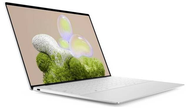 Ein weißer Laptop mit einem Bildschirm, der bunte, schwebende Blasen über grüner Landschaft zeigt. Minimalistisches Design, ultradünner Rahmen.