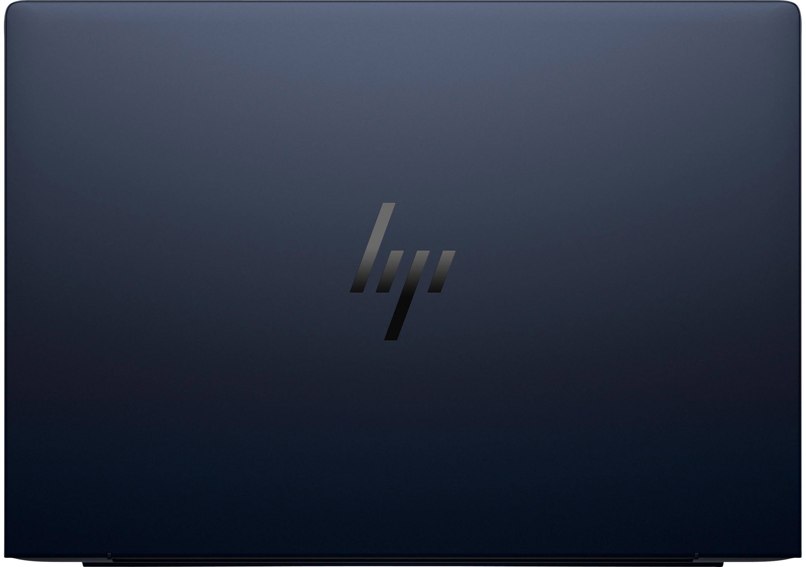 Ein Laptop mit geschlossenem Deckel und einem stilisierten Logo in der Mitte. Der Hintergrund ist dunkel und schlicht.