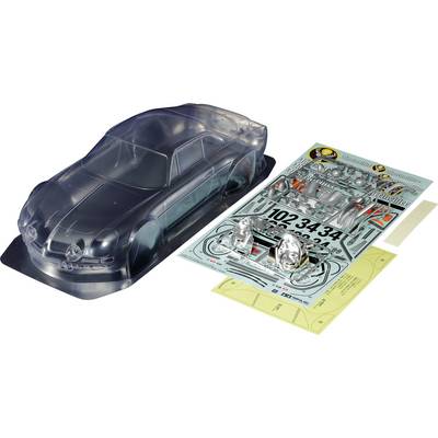 Kunststoffmodellbausatz eines Autos mit transparentem Gehäuse, Aufklebern und Bauteilen auf einem Tisch.