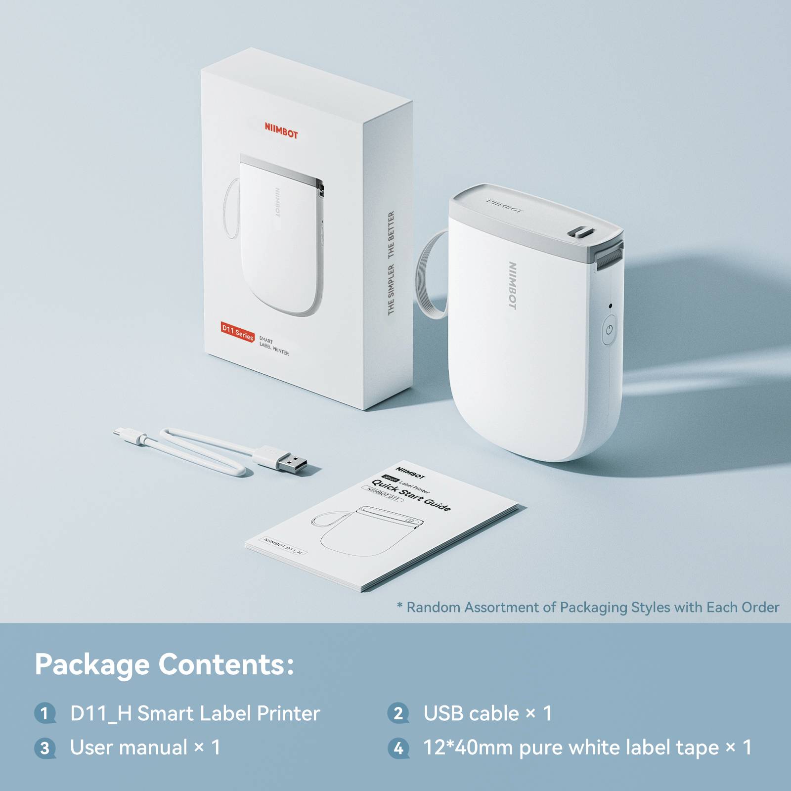 'Elegantes, kompaktes weißes Label-Druckgerät mit Zubehör: USB-Kabel, Bedienungsanleitung, weiße Etikettenrolle. Verpackung in modernem Design.'