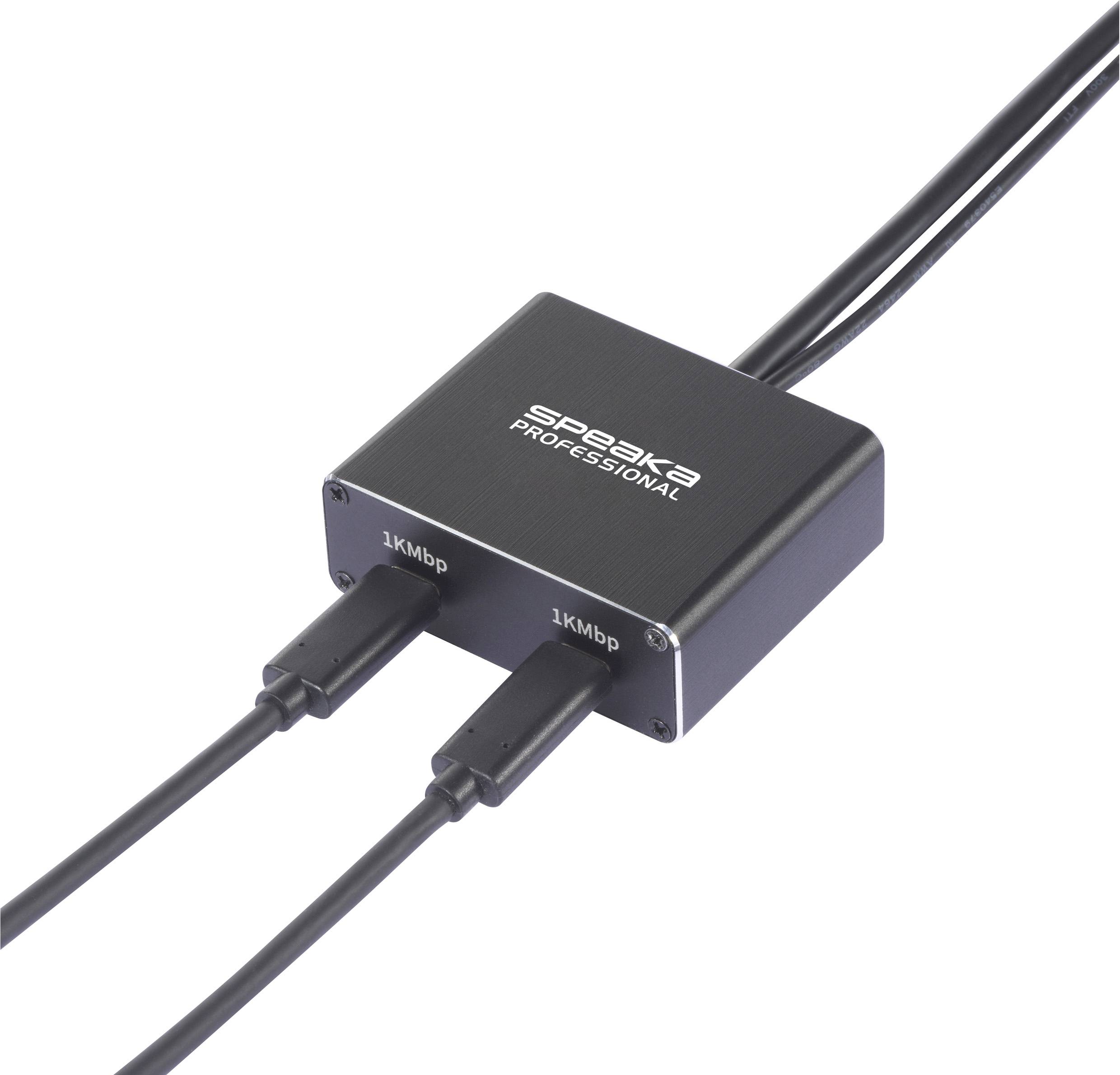 Das Bild zeigt ein schwarzes elektronisches Gerät mit der Aufschrift 'Speaka Professional', das zwei Kabel mit 1KMbp-Anschlüssen verbindet.