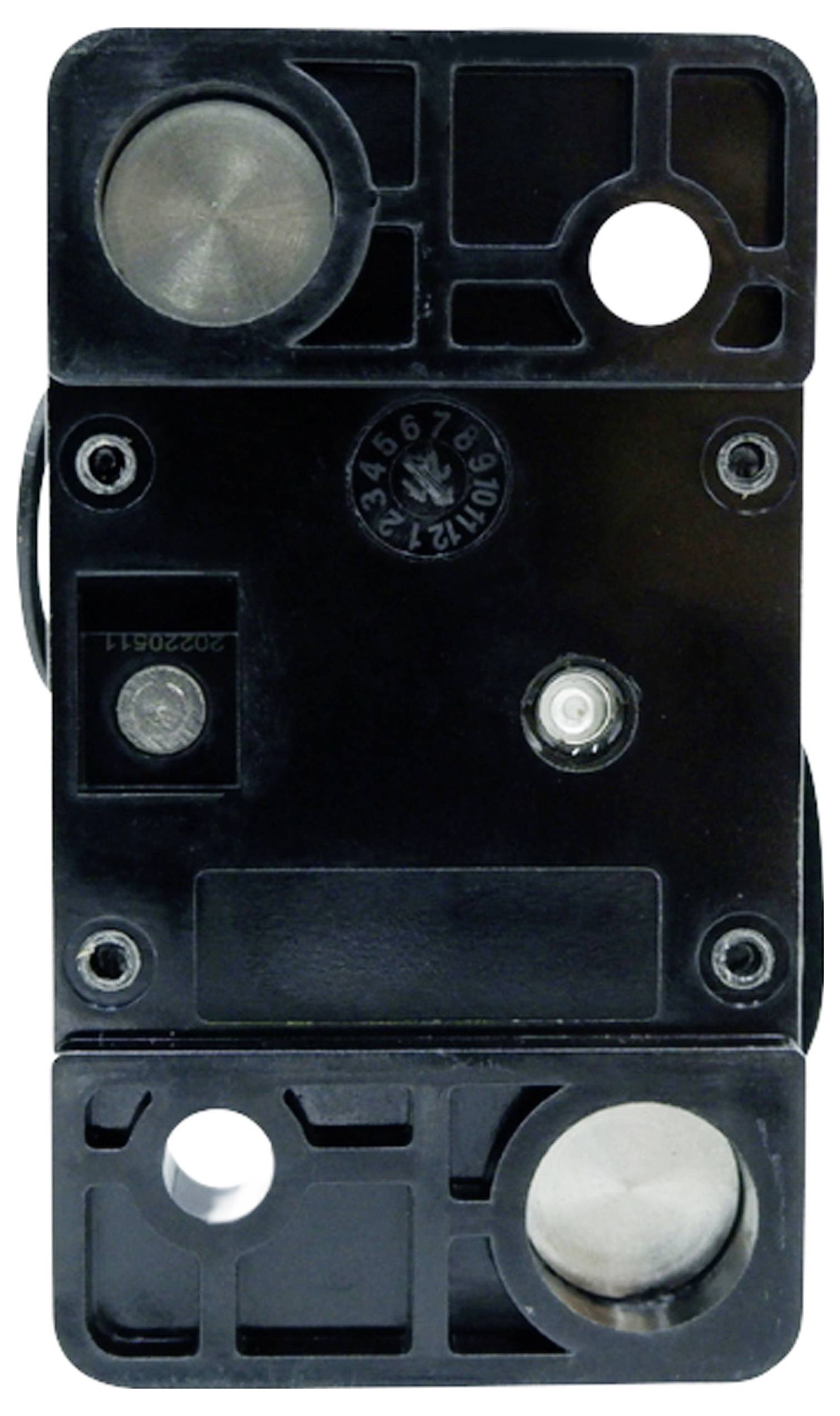 Ein rechteckiges, schwarzes Gehäuse mit runden Metallelementen und Aussparungen, möglicherweise ein technisches Bauteil oder Sensor.