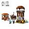 LEGO-Bauset ab 9 Jahren mit 665 Teilen zeigt Minecraft-Szene mit Haus, Turm, Figuren und Tieren.