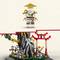 Lego-Spielset mit asiatischem Thema. Oben eine Figur mit Hut und Bart. Unten eine Szene mit Tempel, Felsen und Figuren.