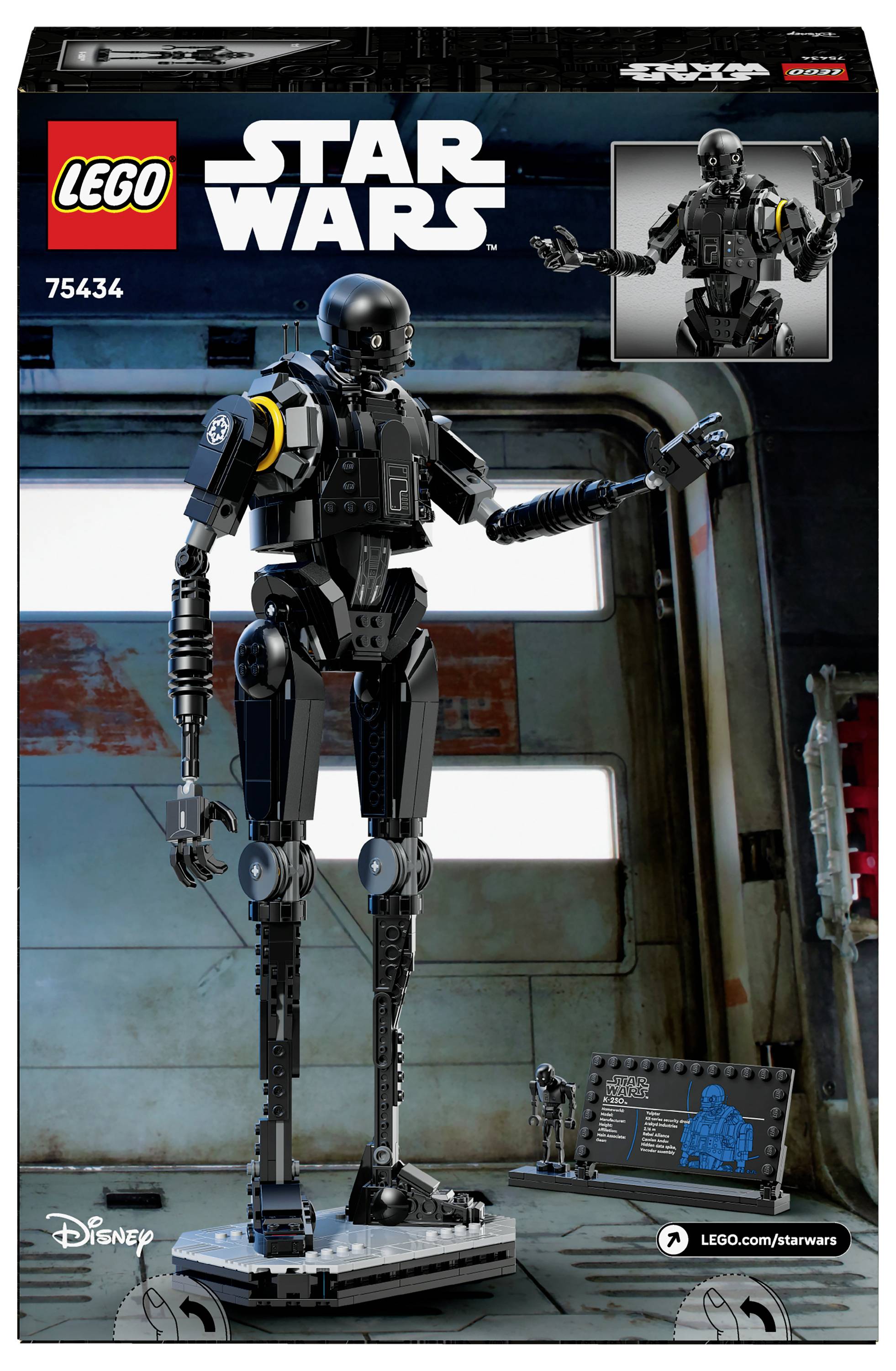 LEGO-Set eines schwarzen und grauen Droiden aus 'Star Wars', Modell 75434, mit Standplakette und Displayständer, auf Verpackung mit Lagerhallen-Thematik präsentiert.