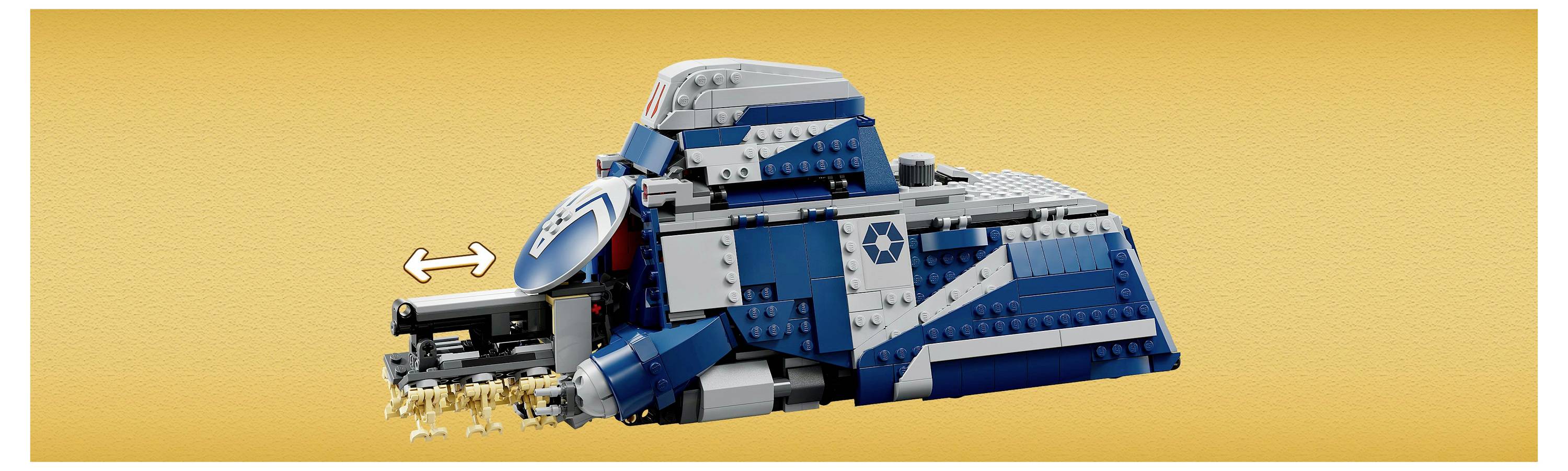 Ein LEGO Raumschiffmodell auf einem gelben Hintergrund mit blau-grauer Gestaltung. Ein Pfeil zeigt nach links und deutet auf Bewegung oder eine Funktion hin.