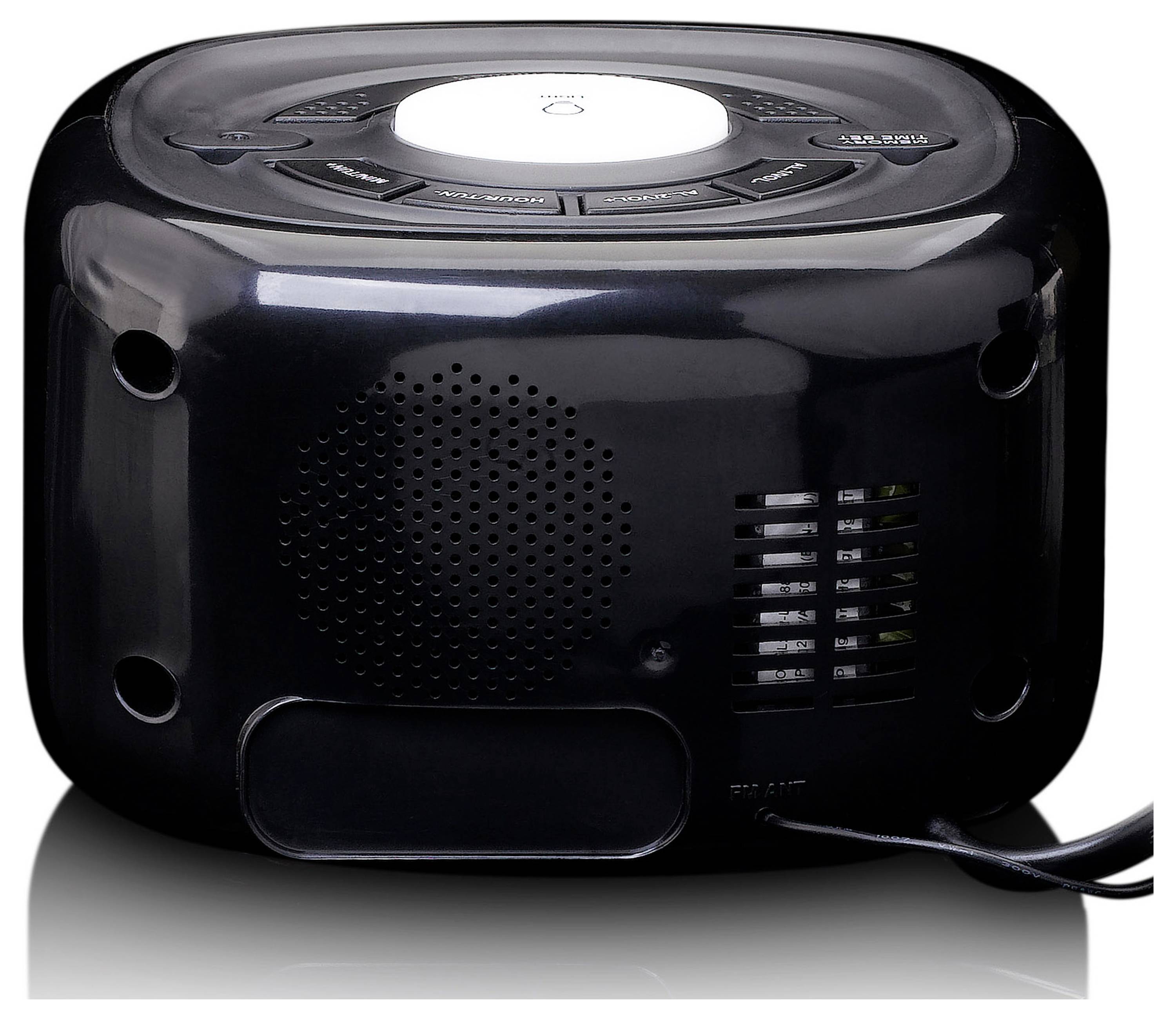 Schwarze elektronische Box mit Lautsprecherschlitzen und Anschlusskabel an der Rückseite, vermutlich ein Haushalts- oder Küchengerät.