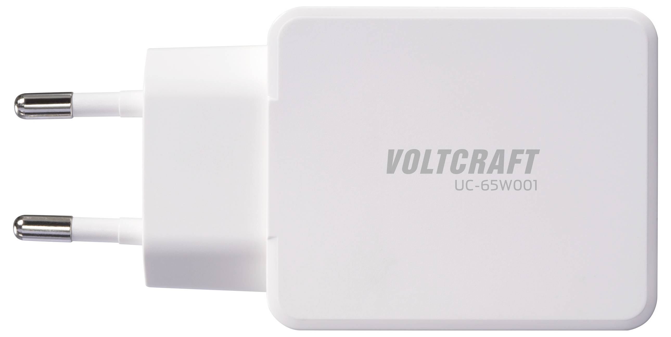 Ein weißer Steckeradapter mit der Bezeichnung 'Voltcraft UC-65W001' mit zwei Metallstiften für eine Steckdose.