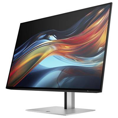 Ein moderner Computer-Monitor mit schlankem Design zeigt ein abstraktes, farbenfrohes Kunstwerk auf dem Bildschirm.
