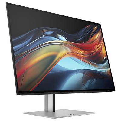 Ein moderner Computermonitor mit einem schlanken Rahmen zeigt ein abstraktes, farbenfrohes Hintergrundbild mit geschwungenen Linien.