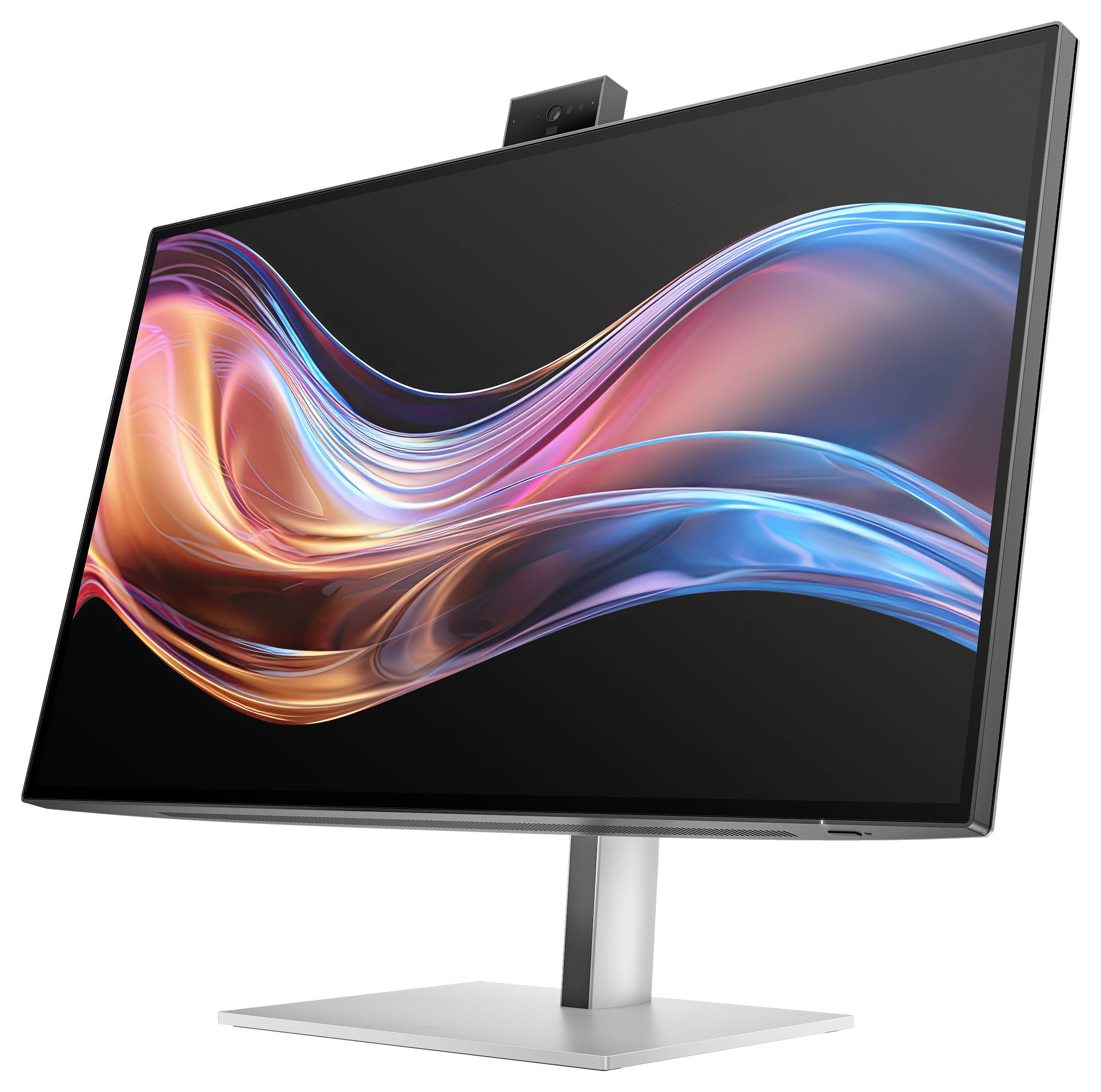 'Moderner Computermonitor mit schmalem Rand und einem dynamischen, bunten Wellendesign auf dem Bildschirm, Seitenansicht.'