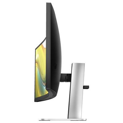 Seitenansicht eines modernen Computerbildschirms auf einem verstellbaren silbernen Standfuß. Der Bildschirm zeigt ein abstraktes, farbiges Design.