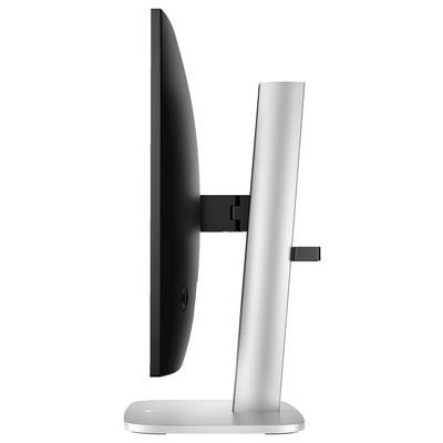 Ein seitlicher Blick auf einen Computermonitor, der an einem silbernen Standfuß befestigt ist. Der Bildschirm ist flach und schlank.