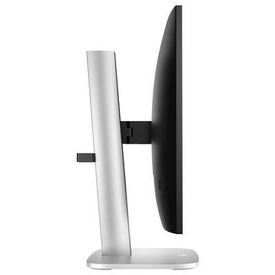 Ein moderner Computermonitor von der Seite, auf einem silbernen Standfuß montiert, mit schlankem, gebogenem Bildschirmdesign.