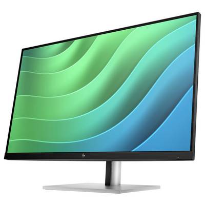 Ein Computerbildschirm zeigt abstrakte grüne und blaue Wellenmuster.