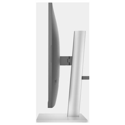 Seitliche Ansicht eines modernen Computermonitors mit dünnem Profil, befestigt an einem schlichten, silbernen Standfuß.