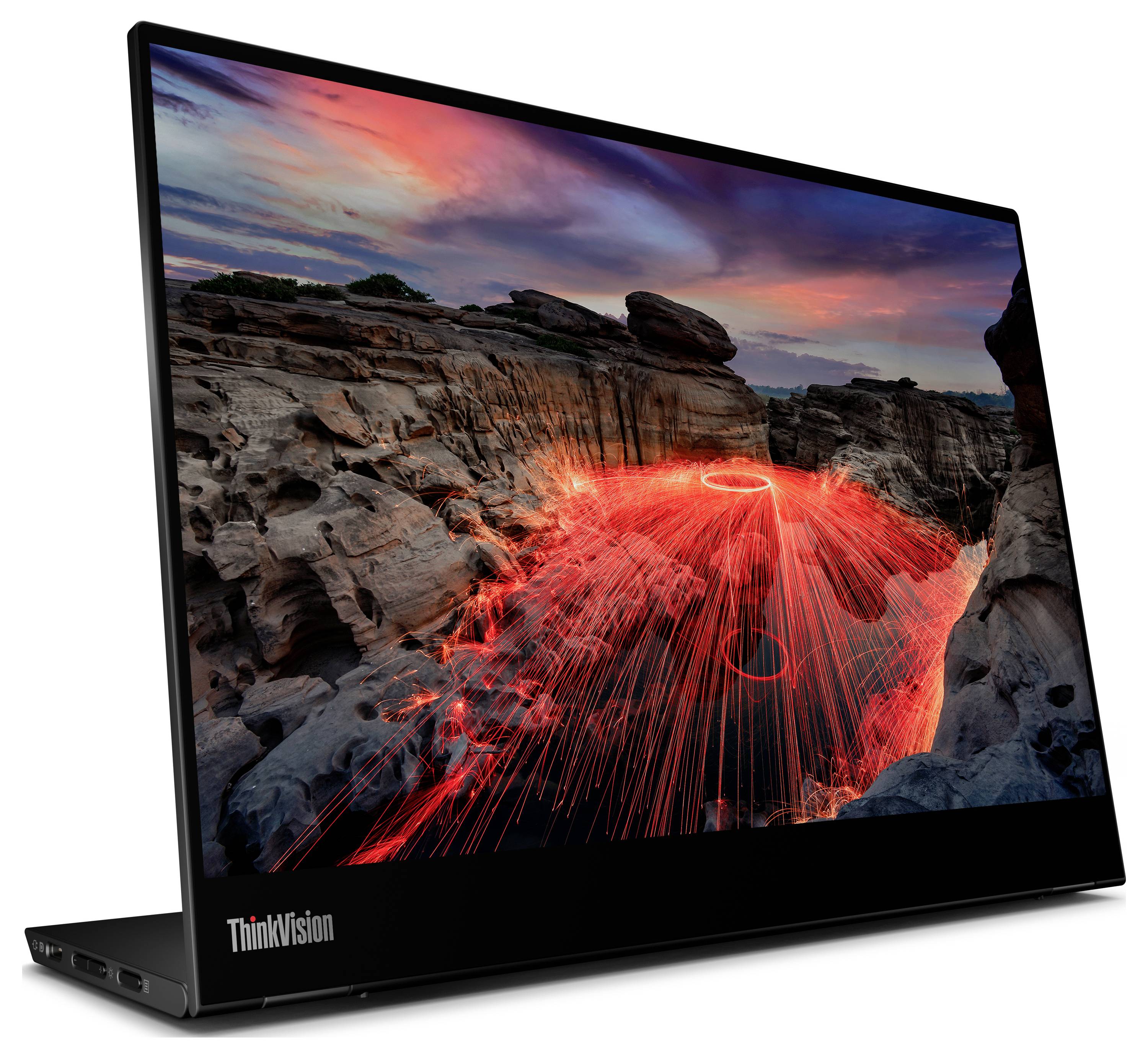 Ein schlanker, rahmenloser Monitor mit lebendiger Bildschirmdarstellung von rot beleuchteten Felsen unter einem farbenfrohen Himmel.