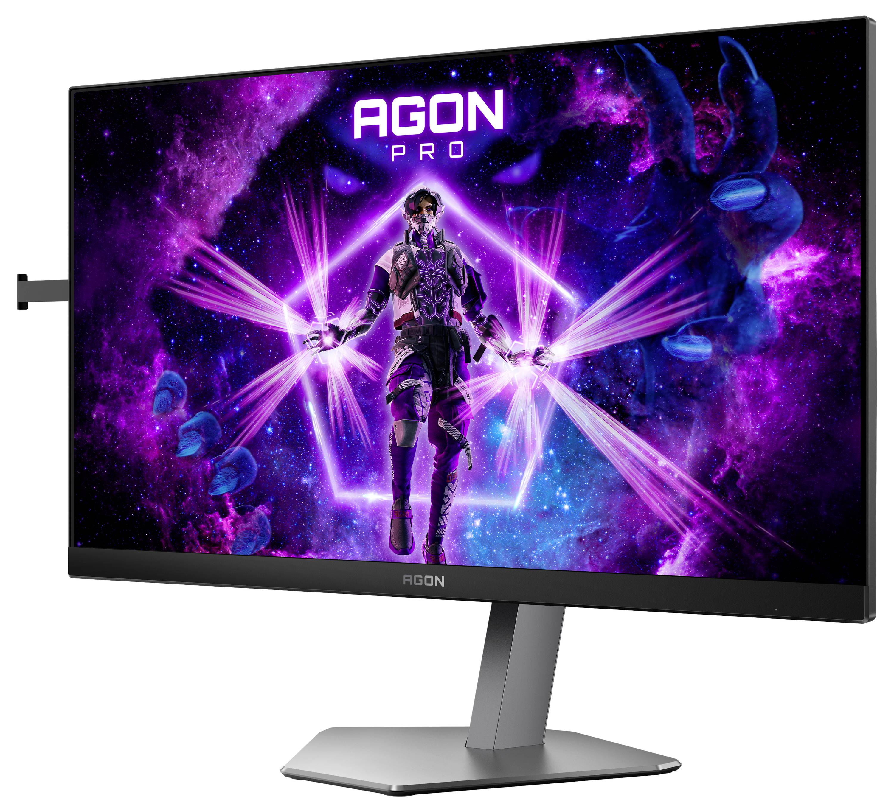 Ein Monitor zeigt ein buntes Science-Fiction-Bild mit einem futuristischen Charakter und dem Text 'AGON PRO'.