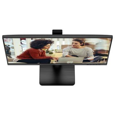 Zwei Personen sitzen an einem Tisch und arbeiten auf einem Laptop. Sie scheinen konzentriert und besprechen wahrscheinlich ein Projekt.