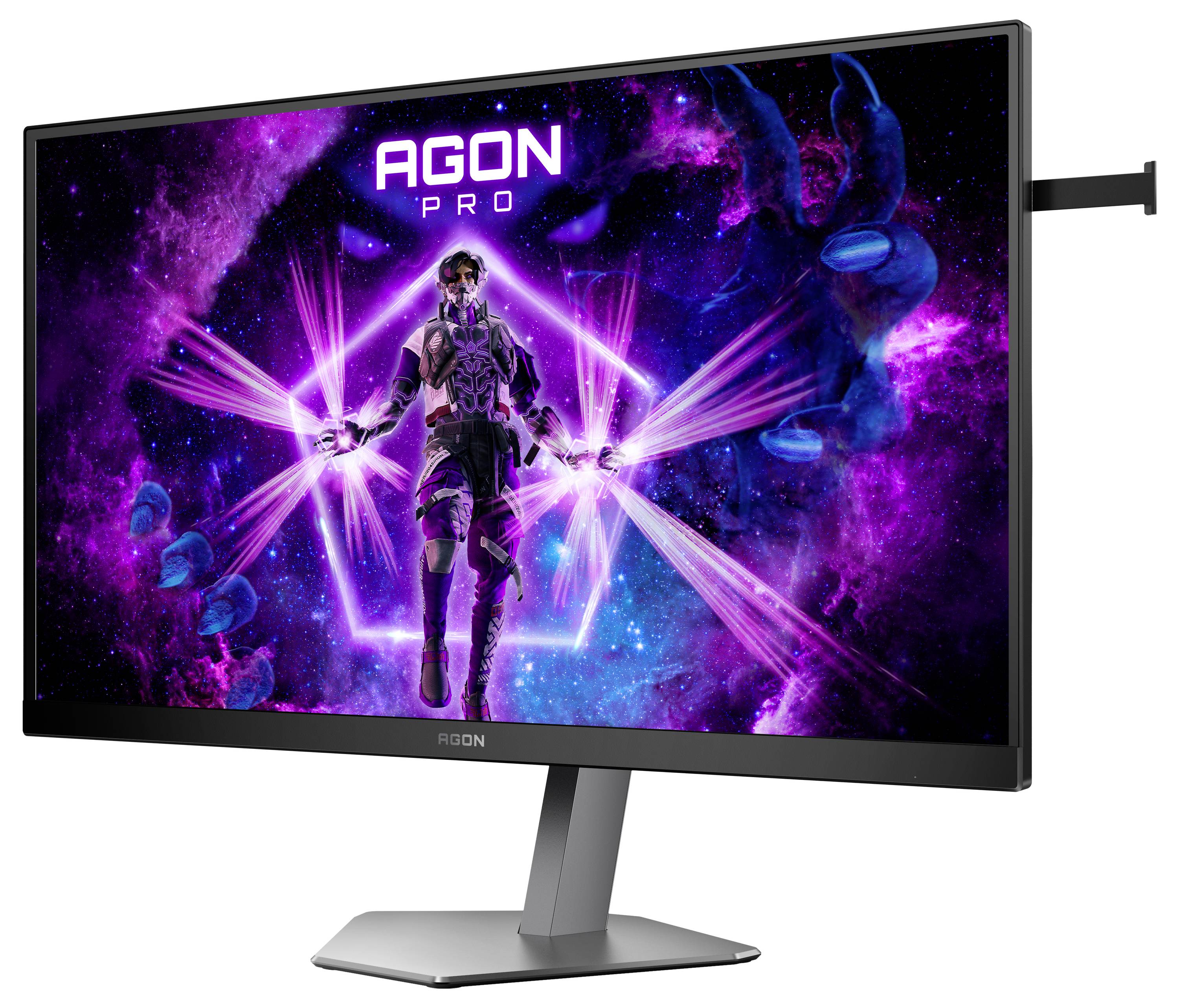 Monitor zeigt ein futuristisches Spielbild mit einer Figur in einem neonbeleuchteten Weltraumhintergrund. Oben steht 'AGON PRO'.