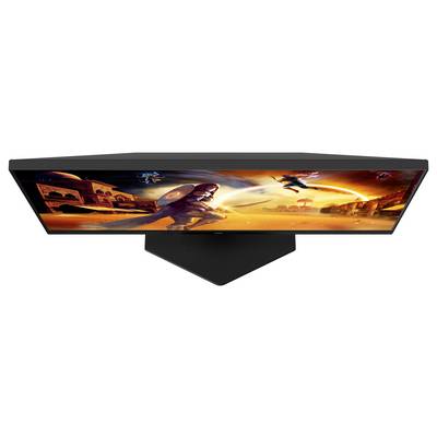 Ein Monitor mit einem leuchtenden Bildschirm, auf dem ein futuristisches, fantasievolles Stadtbild mit zwei kämpfenden Charakteren zu sehen ist.
