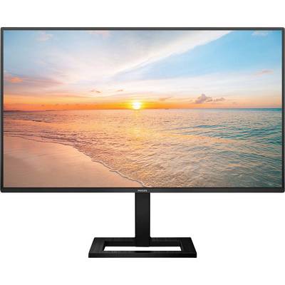 Ein Monitor zeigt ein Bild eines Sonnenuntergangs über dem Meer, mit orangefarbenem Himmel und ruhigem Wasser, das am Strand ankommt.