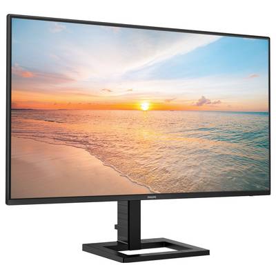 Ein Computermonitor zeigt einen Sonnenuntergang über dem Meer mit einem klaren Himmel.