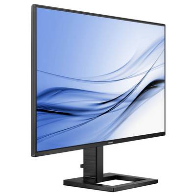 Ein Computermonitor mit einem schmalen Rahmen zeigt ein abstraktes, blau-weißes Wellenmuster auf dem Bildschirm.