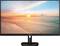 Ein Monitor mit einem Bild von einem Sonnenuntergang über einem ruhigen Strand und Meer. Der Himmel ist bunt gefärbt.