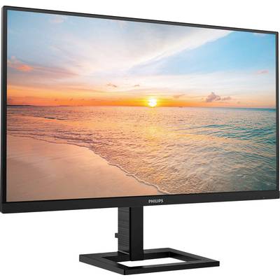 Monitor mit einem Strand-Sonnenuntergang als Hintergrundbild; zeigt Meer und Himmel in warmen Farbtönen.