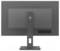 Ein Computerbildschirm von hinten. Der Monitor steht auf einem rechteckigen Standfuß. Das Markenlogo ist auf dem Standfuß sichtbar.