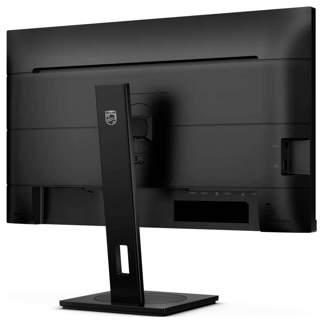 Ein schwarzer Computermonitor von hinten mit schlichtem Design und stabilem Ständer. Anschlüsse und Lüftung sind sichtbar.