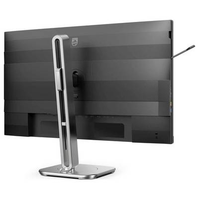 Ein Computerbildschirm von hinten mit einem schlanken, silbernen Ständer. Links befindet sich eine breite Halterung.