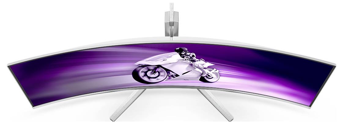 Ein ultrabreiter, gekrümmter Monitor mit einem dynamischen Bild eines Motorradfahrers auf violettem Hintergrund.