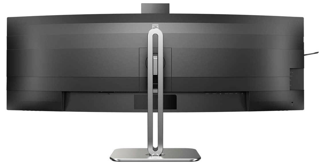 Ein gebogener Computerbildschirm von hinten gezeigt mit einem stabilen Metallständer.