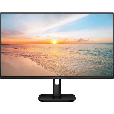 Ein Monitor zeigt ein Bild eines Sonnenuntergangs am Meer mit sanften Wellen, einem klaren Himmel und einem leicht bewölkten Horizont.