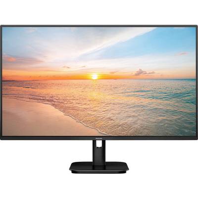 Ein Monitor zeigt ein Sonnenuntergangsstrandbild mit ruhigem Meer und pastellfarbenem Himmel.