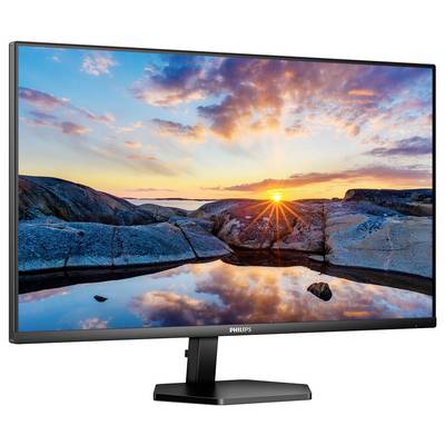 Ein Monitor von Philips zeigt ein Landschaftsbild mit Sonnenuntergang über einem Felsenmeer, das sich in klarem Wasser spiegelt.