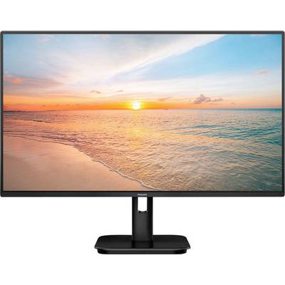Ein Monitor zeigt ein Sonnenuntergangsbild über einem ruhigen Meer mit rosa und blauen Himmel, das auf einem Schreibtisch steht.