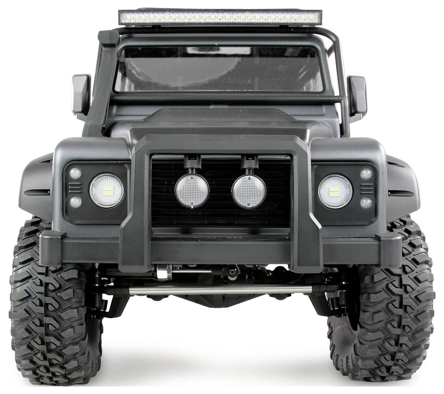 Ein schwarzes, robustes Geländewagenmodell mit großen Reifen und zwei runden Scheinwerfern an der Front.