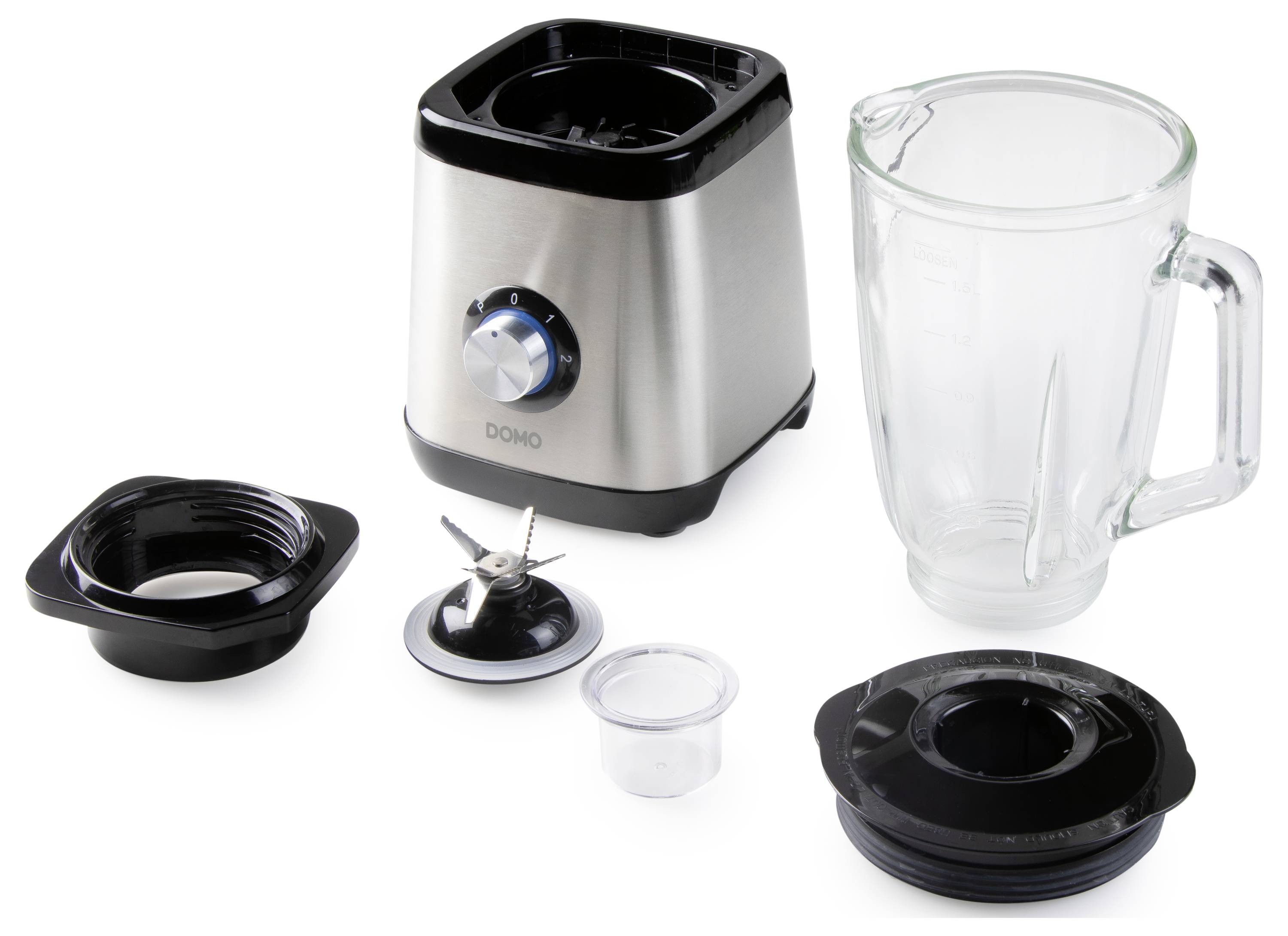 Ein Mixer in Teilen: Basisstation mit Drehknopf, Glasbehälter, Klingenaufsatz, Deckel und Messbecher.
