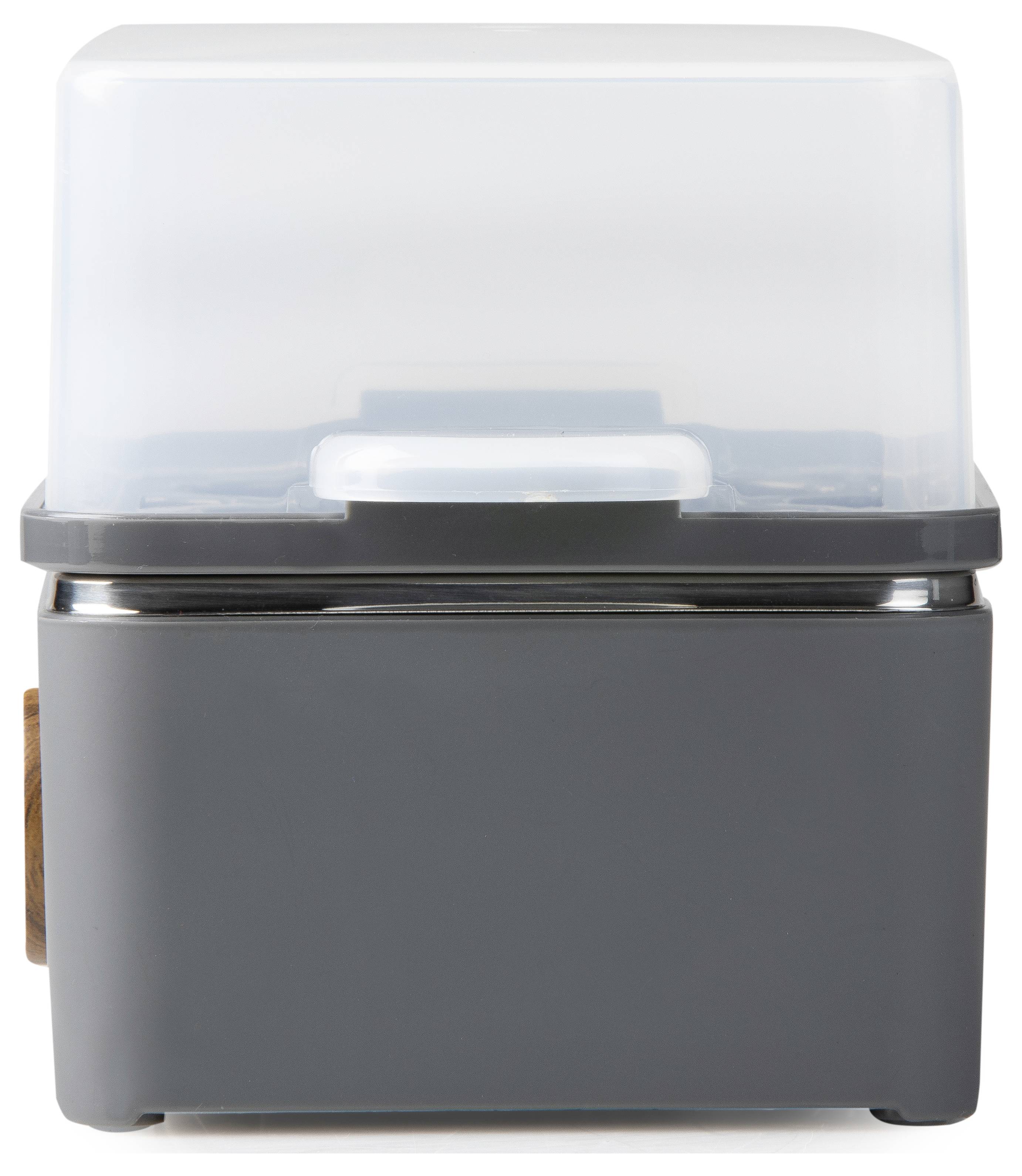 Ein moderner, rechteckiger Toaster mit schwarzem Gehäuse und transparentem Deckel, geeignet zum Toasten und Erwärmen von Brotscheiben.